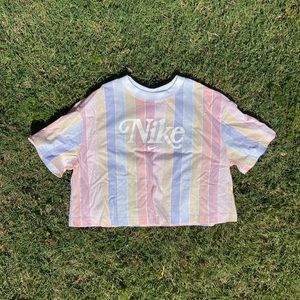 Pastel striped crop top with large Nike logo